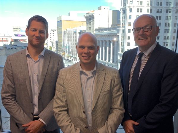AgraCity CFO Derek Penner (centre, with Laurentian Bank Securities vice-president Ty Wirvin (l) and director of investment banking Kevin Hooke) is gauging farmers’ appetite for investment in a new grain handling and fertilizer partnership, ideally by taking control of CWB. (Dave Bedard photo)