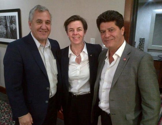 From left, CN chief operating officer Jim Vena, federal Labour Minister Kellie Leitch and Unifor president Jerry Dias, after CN and Unifor reached a tentative labour agreement late Monday. (CNW Group/Employment and Social Development Canada)
