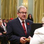 Canada’s new Agriculture and Agri-Foods Minister Lawrence MacAulay (l) is sworn-in during a ceremony at Rideau Hall in Ottawa November 4, 2015. Photo: REUTERS/Chris Wattie 
