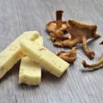 Bothwell Cheese, whose seasonal extra-old cheddar with Untamed Feast’s alder-smoked wild Chanterelle mushrooms is shown here, plans to launch new varieties of Non-GMO Verified cheddar in 2017. (BothwellCheese.com)
