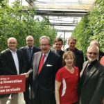 Jeff Leal, Ontario’s minister of agriculture, food and rural affairs (fourth from left), announced the new Greenhouse Competitiveness and Innovation Initiative at a greenhouse in Bowmanville, Ont. (Photo courtesy OMAFRA)
