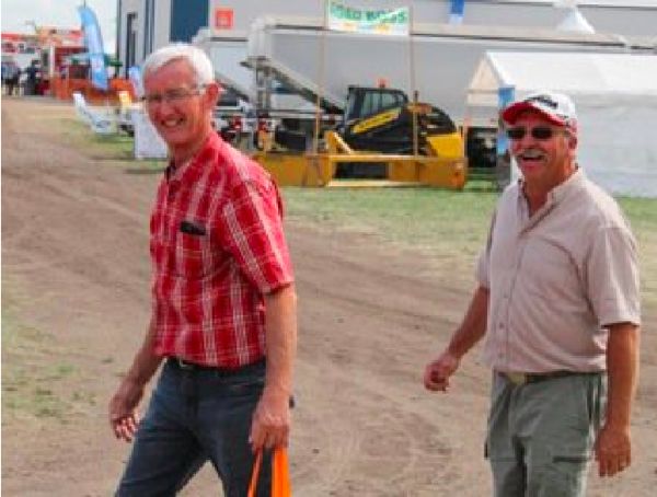 Farmers Dennis Reimer (l) and Charles Schmidt, looking for rain. (Lee Hart photo)
