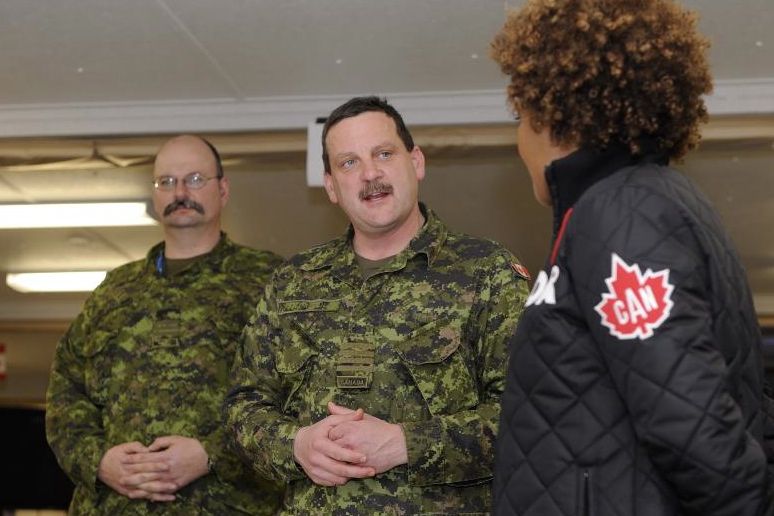 Andre Corbould (centre), shown here briefing then-Governor General Michaelle Jean (r) in Whistler, B.C. during the 2010 Olympics, is Alberta’s new deputy agriculture minister. (GG.ca)

