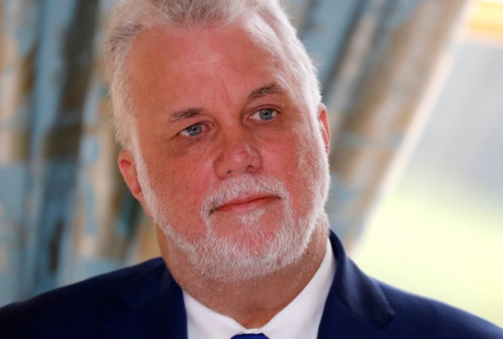 Quebec Premier Philippe Couillard attends a joint news conference with French President Emmanuel Macron after a meeting at the Elysee Palace in Paris, France March 5, 2018.  Photo: REUTERS/Gonzalo Fuentes
