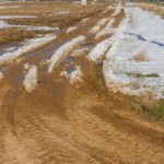 File photo of snowmelt on a gravel road. (PBouman/iStock/Getty Images)
