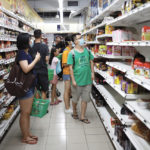Consumers stock up at a Singapore supermarket on Feb. 7, 2020 after the state raised its coronavirus outbreak alert to orange.