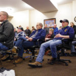 Concerned residents lined the walls and into the hallway as representatives from the now closed Morris Sales and Service stood up to address questions on the future of the dealership March 11 in Virden.