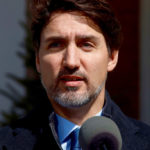 Prime Minister Justin Trudeau speaks to media outside his Ottawa home, March 16, 2020.
