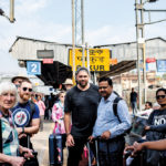 Bergmann (centre, in black shirt) with Foodgrains Bank staff on a tour in India.