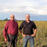 Brian (left) and Andy Sterling say the native prairie restoration along the Jackson Creek was a longtime family dream.