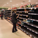 An employee takes inventory at a grocery store amid coronavirus fears spreading, in Toronto March 13, 2020.