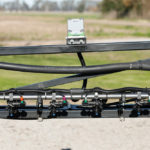 The back side of a standard New Holland boom retrofitted with the WEED-IT Quadro. Retailer Croplands Equipment sells the Quadro in either a retrofit kit which allows it to be installed on most types of existing sprayer booms or as a120-foot Millennium boom.