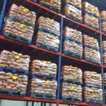 File photo of 10-pound sacks of potatoes loaded on pallets at a Canadian distribution centre.