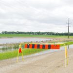 While not as impacted as roads north of Brandon, roads in the R.M. of Cornwallis near the Brandon Hills also saw overflowing roads and flooded fields June 28-29.