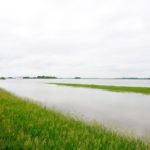 A temporary lake overtakes the landscape north of Brandon June 29 following torrential rain and widespread overland flooding.