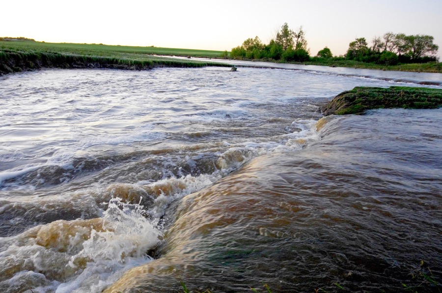 Roadside ditches become rapids east of Forrest after storms dropped over 214 millimetres of rain starting June 28.