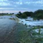 A municipal road north of Brandon goes from dry to dramatic waterfall in the space of three hours June 29.