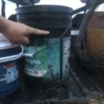 Empty buckets left out overnight June 28 display the scale of rainfall near Rivers during the first of what would end up being a string of storms into the first week of July.

