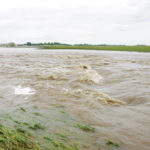 Fast running waters replace what was an approach just north of Brandon following intense thunderstorms that brought torrential rains.