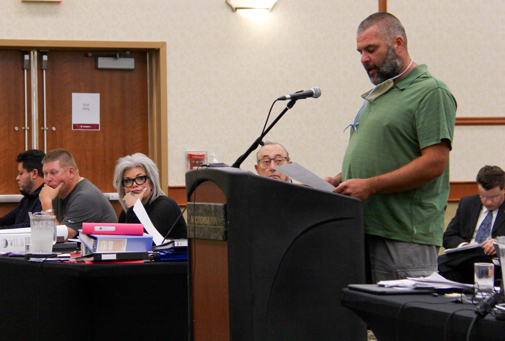 Rosser resident Dave Kaplen speaks on the second day of the hearing, July 28.