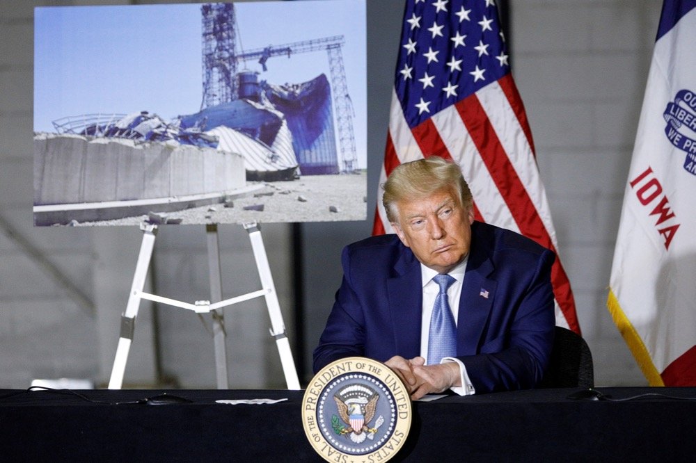 U.S. President Donald Trump participates in a disaster recovery briefing following last week’s severe windstorm, at the Eastern Iowa Airport in Cedar Rapids on Aug. 18, 2020. (Photo: Reuters/Tom Brenner)
