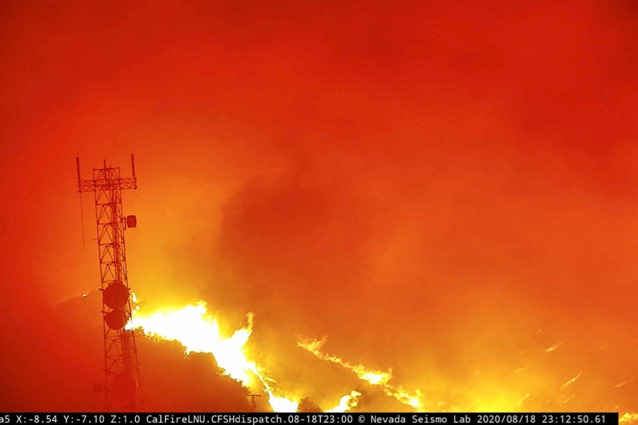 Flames from the Hennessey Fire are seen in the last image from a tower-mounted camera before it melted, according to AlertWildfire, on Atlas Peak northwest of Vacaville, Calif. on Aug. 18, 2020. (Photo: Alertwildfire.org/Handout via Reuters)
