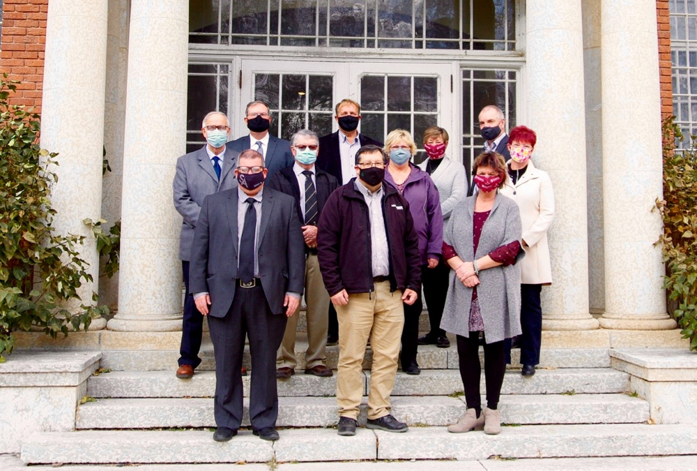 Assiniboine Community College staff and supporters stand outside the college’s Valleyview Building, the future home of the Prairie Innovation Centre for Sustainable Agriculture.