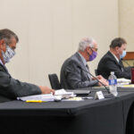 Municipal board members (L to R) Rick Borotsik, Tom Raine and George Orle hear evidence at an appeal hearing in August.