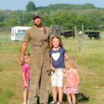 Gerond Davidson — seen here with his family — is the fifth generation to farm at Springbank Farm near Neepawa.