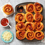 Families are invited to bake savoury pizza swirl buns with Emily Richards, a cookbook author and home economist.