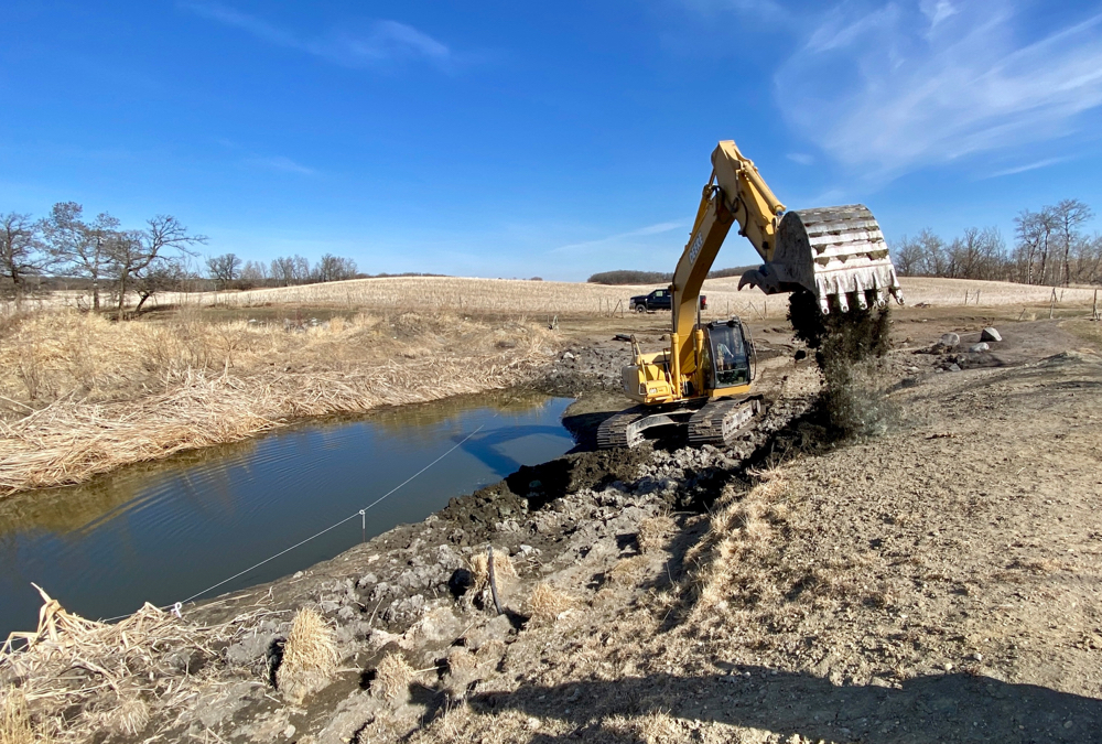 Months of dry weather have left lots of dugouts low and in need of freshwater. Ryan Young of Middleton Ventures widened and deepened Manitoba Co-operator reporter Allan Dawson's dugout near Altamont April 10 before the recent snow. (Young is Dawson's son-in-law)