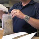 Screenshot from an Alberta Agriculture video profiling Innisfail-based pulse and grain handler W.A. Grain and Pulse Solutions. (Alberta Agriculture and Forestry via YouTube)