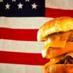 Operating in a comparatively more theatrical political environment than Canada, U.S. President Joe Biden is tasked with convincing producers he does not plan on banning hamburgers.