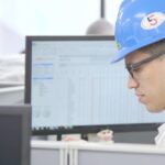Video screengrab featuring an office at the JBS beef plant at Brooks, Alta. (JBS video via YouTube)