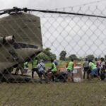 Workers unload humanitarian aid from a U.S. military helicopter at the airport at Les Cayes, Haiti on Aug, 18, 2021 after Saturday’s 7.2 magnitude earthquake. (Photo: Reuters/Henry Romero)