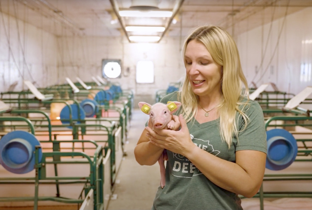 A still taken from a promotional video for AITC-M’s Follow the Farmer program.