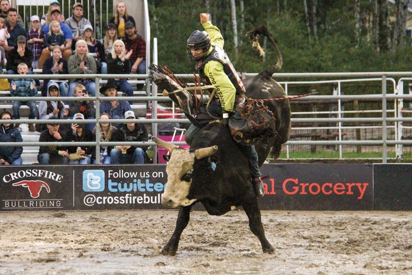 Bull riders struggled to stay aboard their full eight seconds in the arena, which had been turned to mud by a day of rain.