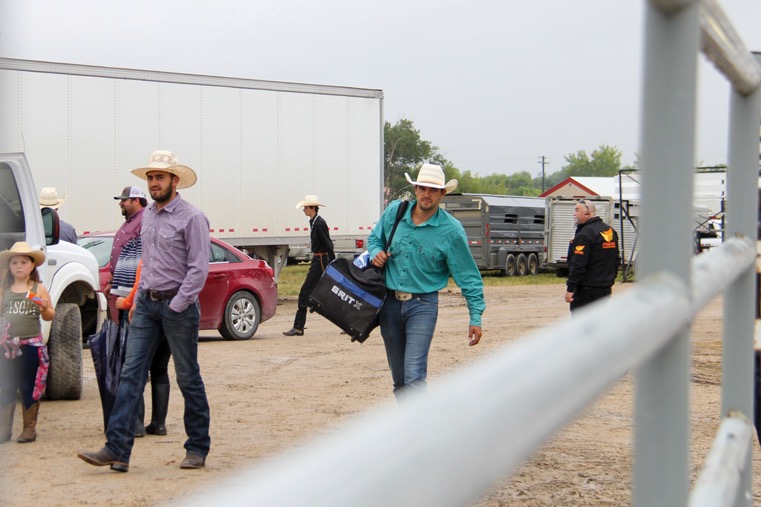 Riders arrive at the arena for the contest.