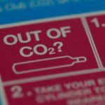 An information label is seen on packaging for a CO2 cylinder for a fizzy drinks machine in Manchester, Britain on Sept. 20, 2021. (Photo: Reuters)/Phil Noble)