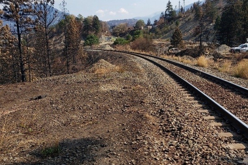 An eastward-facing view from the north edge of the crossing at Mile 98.14 of CN’s Ashcroft subdivision, where BCWS suspected the Lytton fire began. (TSB photo)
