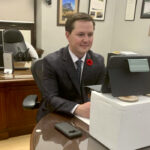 After denying he had a drinking problem, Devin Dreeshen drew more criticism for posting this picture on social media. Critics said perching his iPad on a drinks cooler wasn’t amusing and others pointed to what appears to be a wine bottle under the desk on the right-hand side of the photo. Dreeshen resigned as ag minister Nov. 5.  Photo: Twitter
