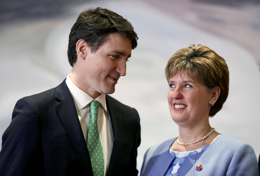 Prime Minister Justin Trudeau congratulates Marie-Claude Bibeau after she was sworn in as minister of agriculture and agri-food during a cabinet shuffle at Rideau Hall in Ottawa March 1, 2019.