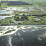 2011 flood lawsuit settlement pending court OK