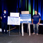 Central Assiniboine Watershed District (CAWD) chair Jeff Elder (l to r), Manitoba Association of Watersheds (MAW) chair Gary Wasylowski, CAWD manager Neil Zalluski, and Manitoba Agriculture and Resource Development Minister Ralph Eichler unveil the design for incoming watershed district signage Dec. 7.