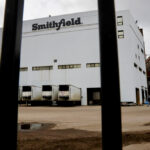 Workers exit the Smithfield Foods pork plant as the spread of the coronavirus disease (COVID-19) continues, in Sioux Falls, South Dakota, U.S., April 16, 2020.