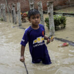 Heavy rains and river overflow led to this flooding on Jan. 2 in the Aceh province of Indonesia, the world’s largest palm oil-producing nation.