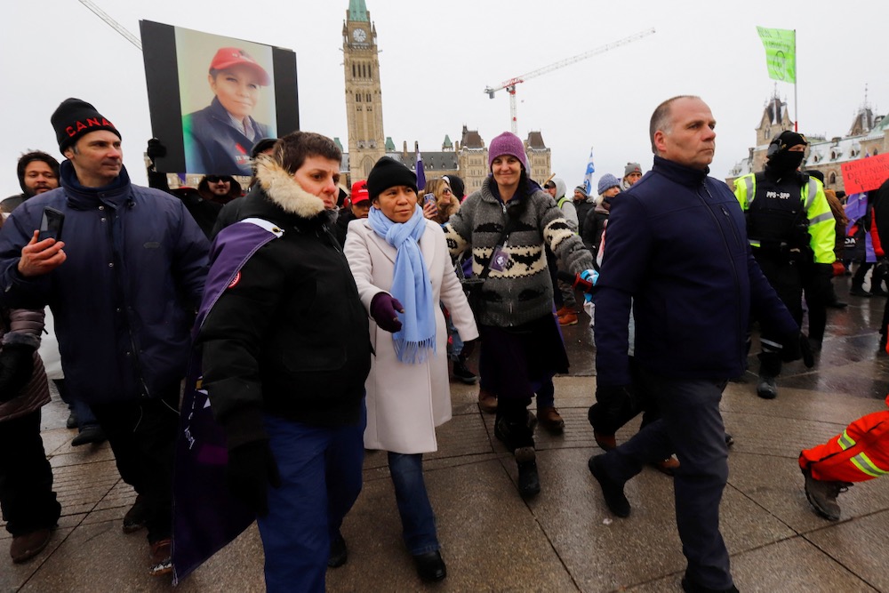 Romana Didulo, the self-declared “Queen of Canada” and a leading Canadian QAnon figure, leaves after speaking on Parliament Hill as truckers and supporters continue to protest COVID-19 vaccine mandates, in Ottawa on Feb. 3, 2022. (Photo: Reuters/Patrick Doyle)
