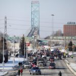 Protestors’ vehicles block the Ambassador Bridge on Feb. 8, 2022. If supply chains are the backbone of our economy, the border is its spinal cord.