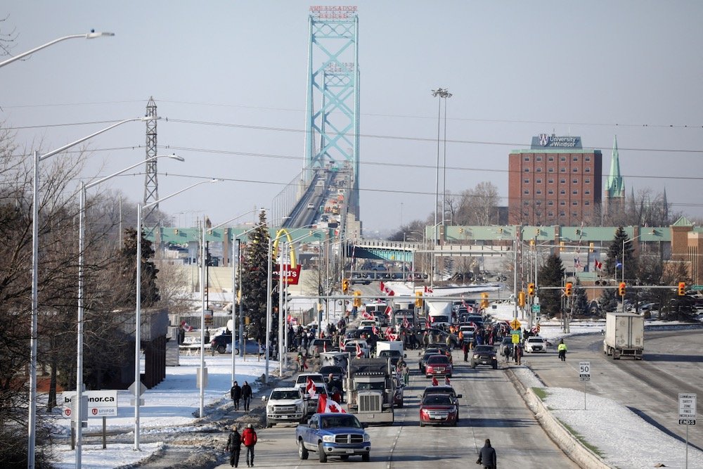 Protestors’ vehicles block the Ambassador Bridge on Feb. 8, 2022. If supply chains are the backbone of our economy, the border is its spinal cord.