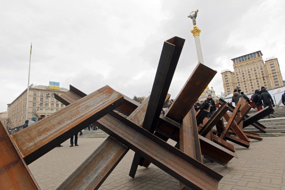 Anti-tank ‘hedgehogs’ are seen in Maidan Nezalezhnosti Square in Ukraine’s capital, Kyiv, on March 9, 2022. Farmers are among those assembling the obstacles, set up to block roads against advancing armoured vehicles. (Yevhen Kotenko/Ukrinform/Abacapress.com via Reuters)

